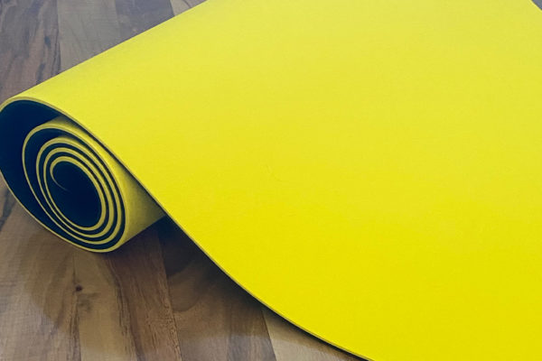 lifestyle rolled yellow yoga mat